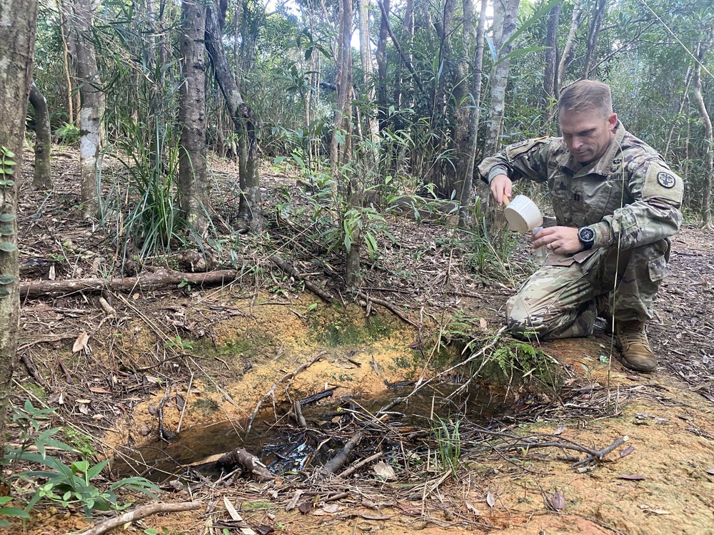 CPT John Eads collects insect while deployed to Okinawa