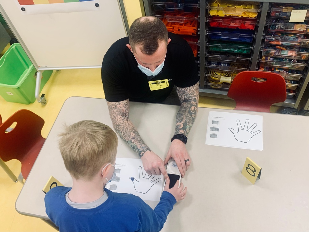 Garrison showcases fingerprints and science at Wiesbaden Elementary