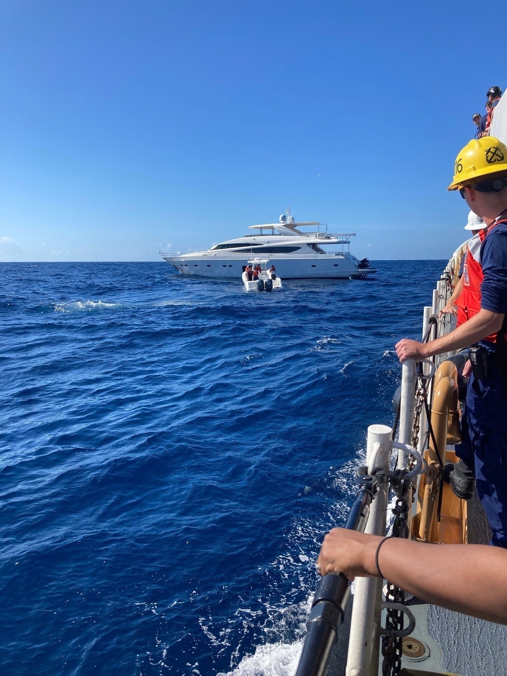 Coast Guard cutters, helicopter crews aid U.S. Florida yacht Current Sea taking on water in the Mona Passage near Puerto Rico