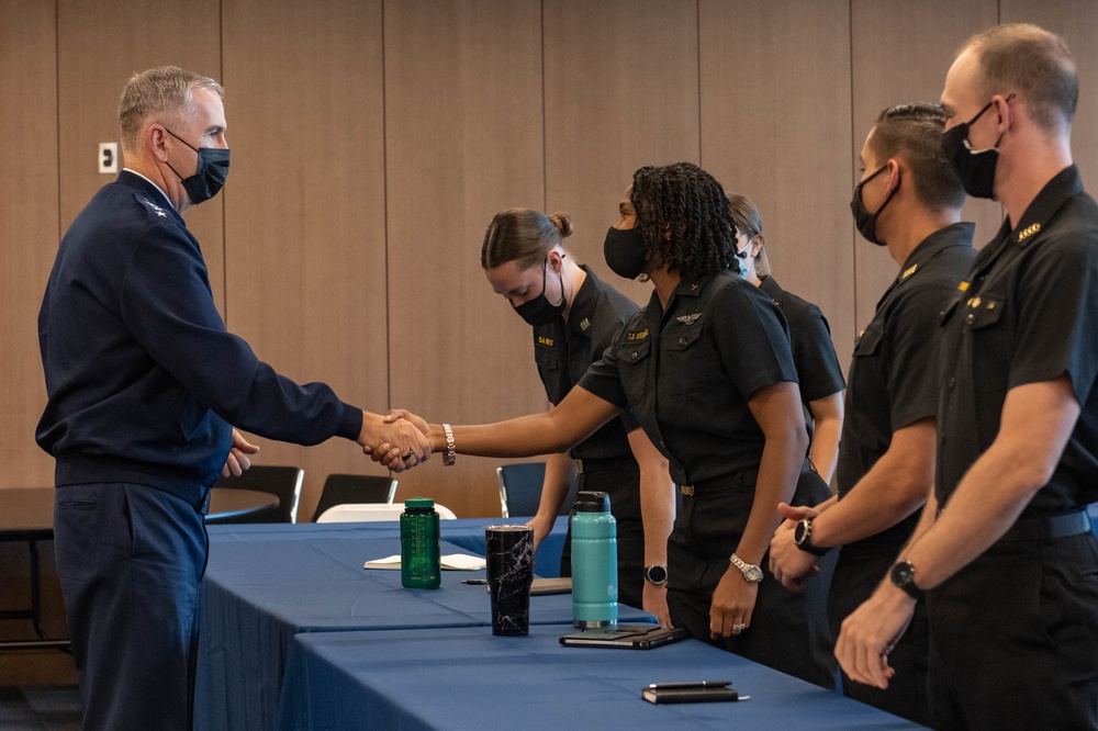 U.S. Air Force Gen. John Hyten talks with Midshipmen