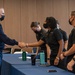 U.S. Air Force Gen. John Hyten talks with Midshipmen