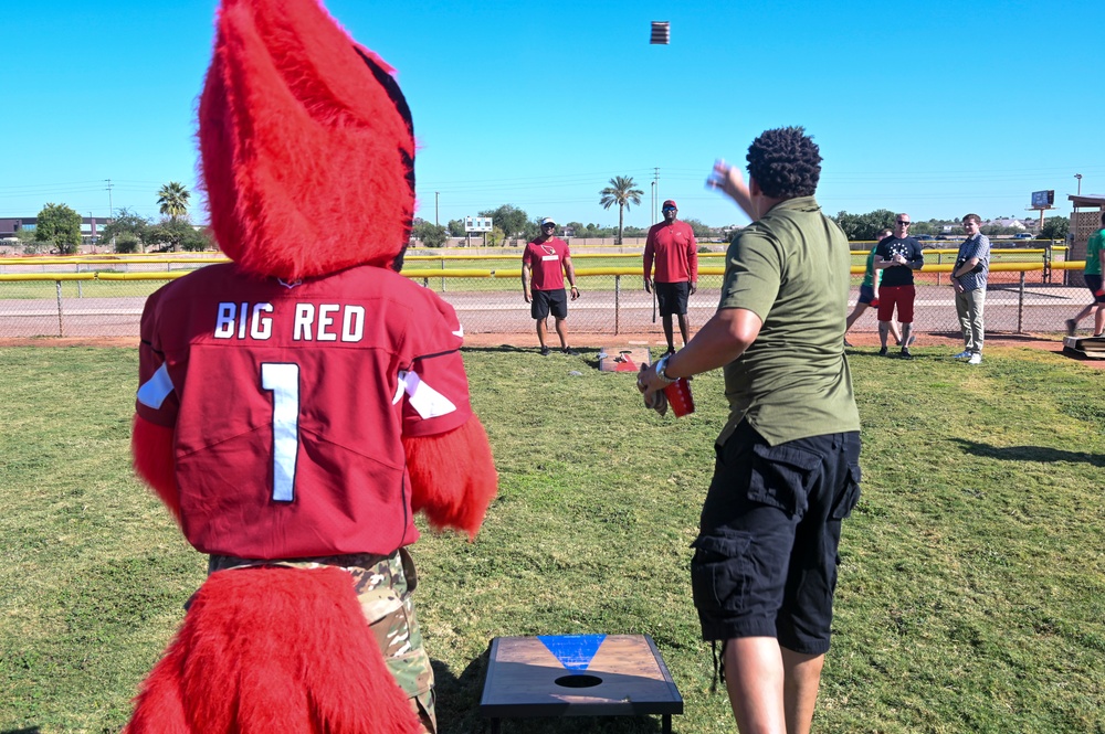Cardinals Alumni and Cheerleaders tour Luke AFB