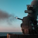 The forward-deployed amphibious assault ship USS America (LHA 6) fires its Phalanx Close-In Weapons System.