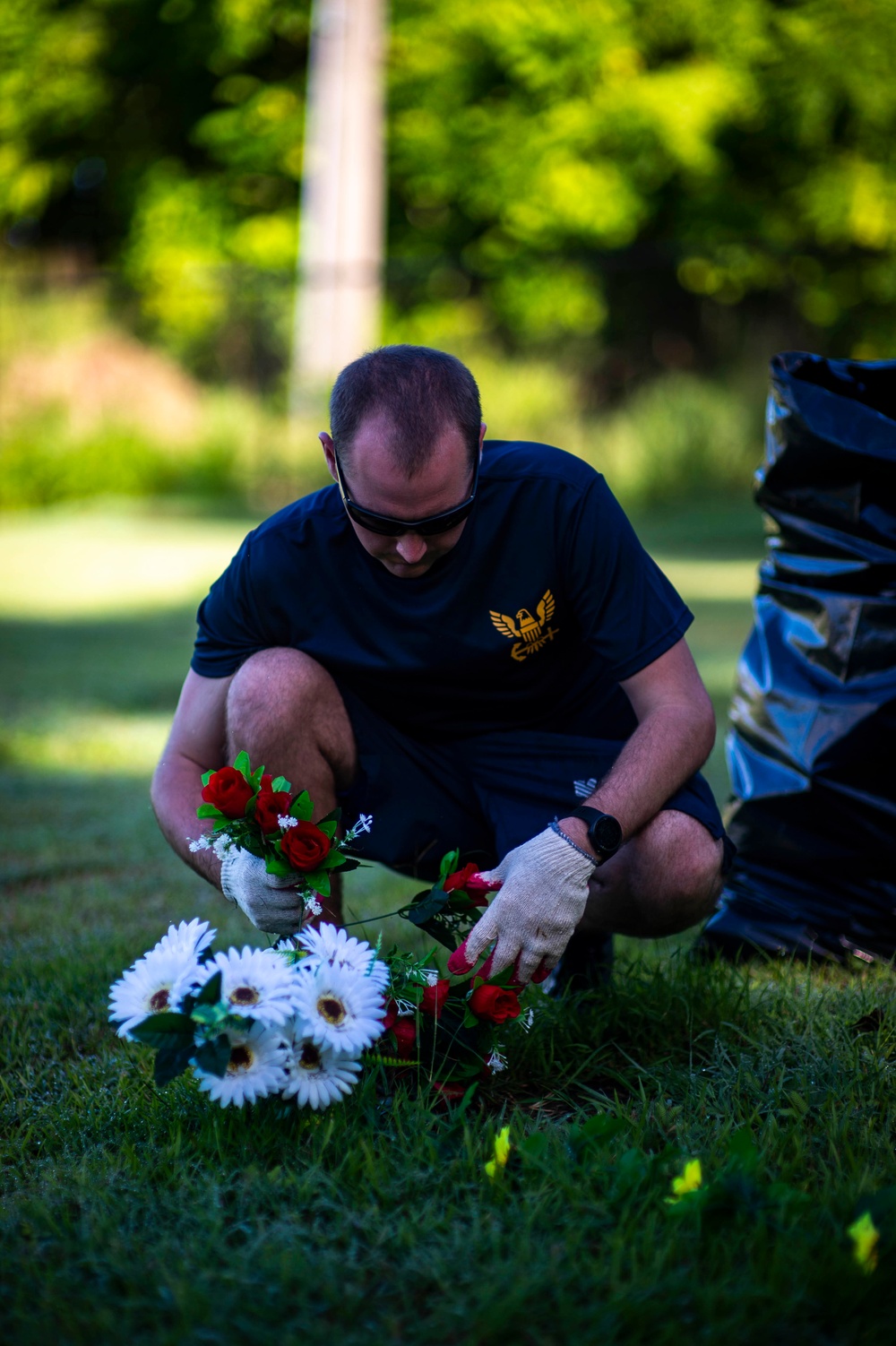 Carrier Strike Group One Sailors Conduct a Cemetery Beautification Project During a Port Visit in Guam
