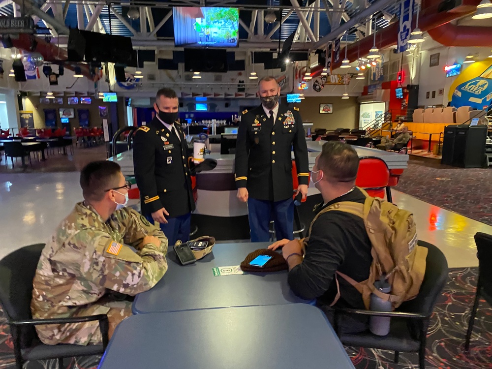 Garrison command team members visit with troops on Veterans Day at Fort McCoy