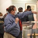 Museum volunteer leads guided tour