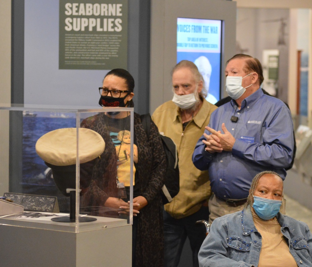 Museum volunteer leads guided tour