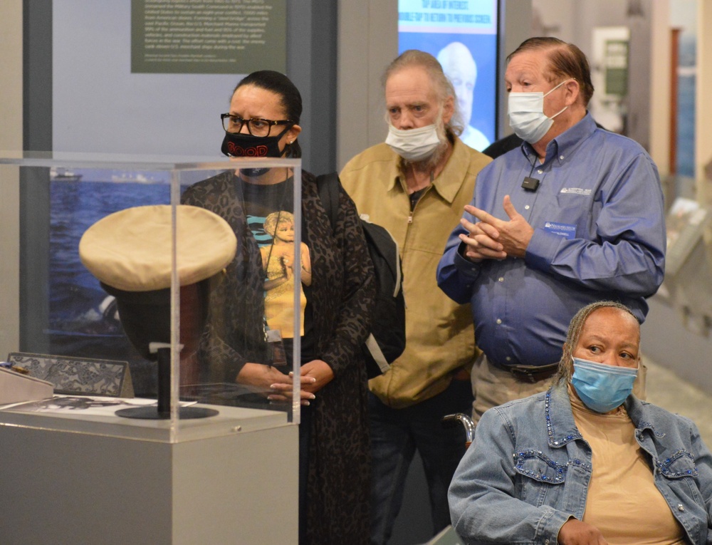 Museum volunteer leads guided tour