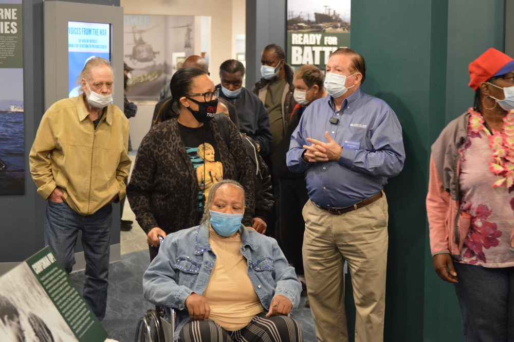 Museum volunteer leads guided tour