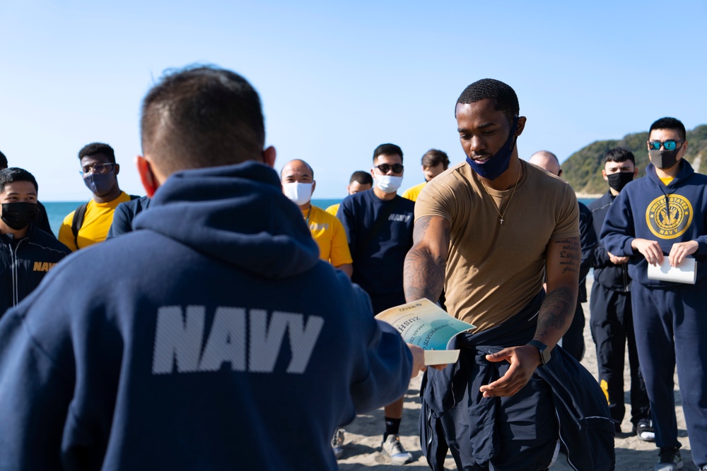 CFAY Sailors pick up trash at the annual Zushi Beach clean-up