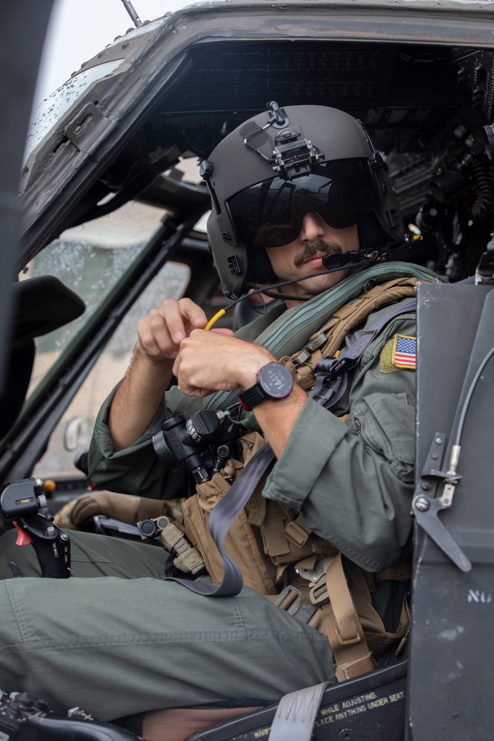 US Army UH-60 Blackhawks perform deck landing qualifications aboard USS John Paul Jones
