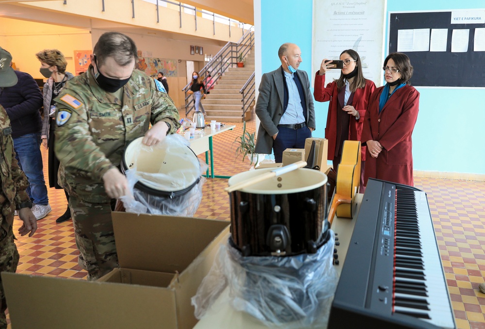 KFOR Soldiers deliver donated musical instruments to the Zenel Hajdini School in Trstenik (Glogovac)