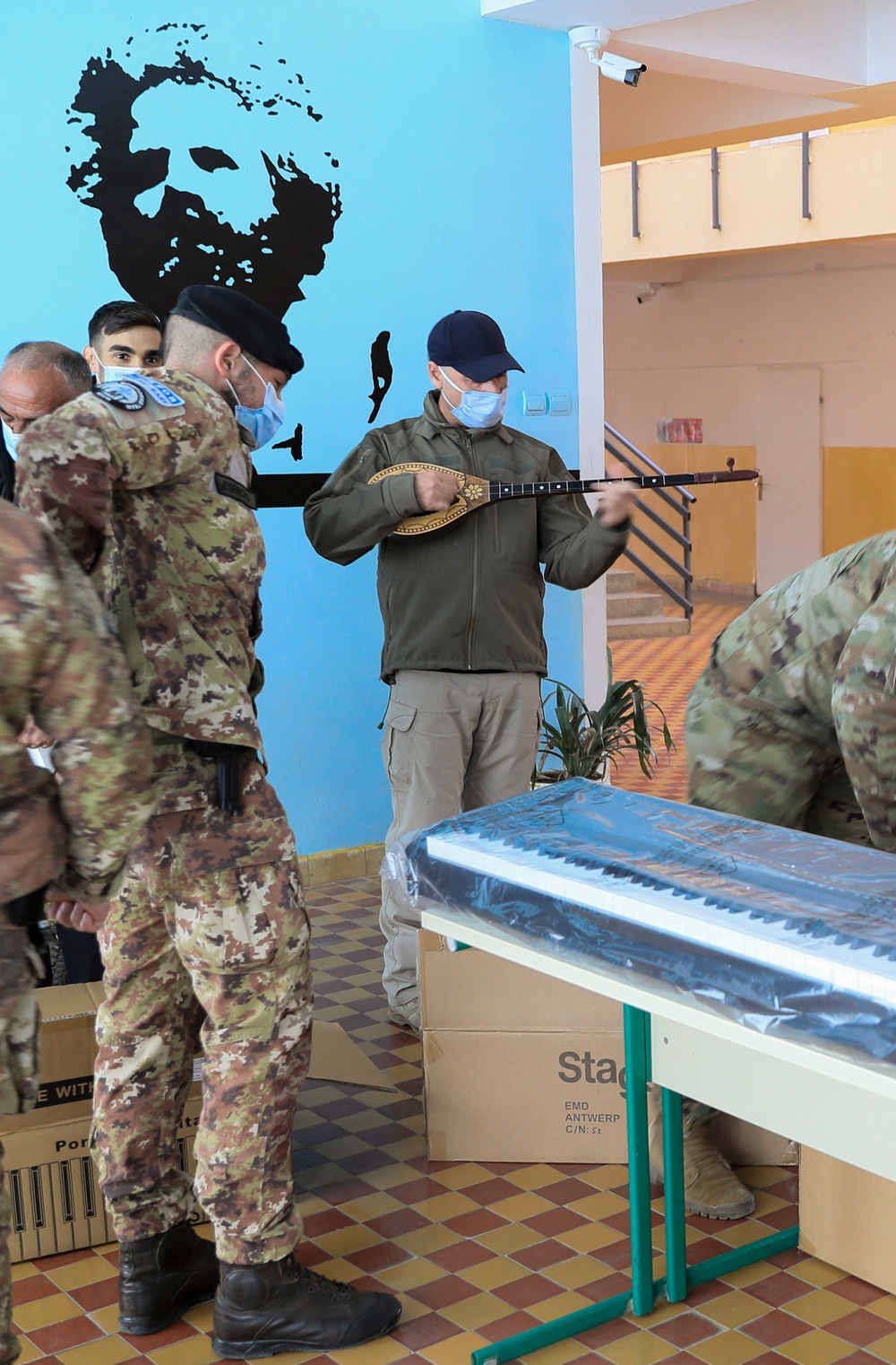 KFOR Soldiers deliver donated musical instruments to the Zenel Hajdini School in Trstenik (Glogovac)