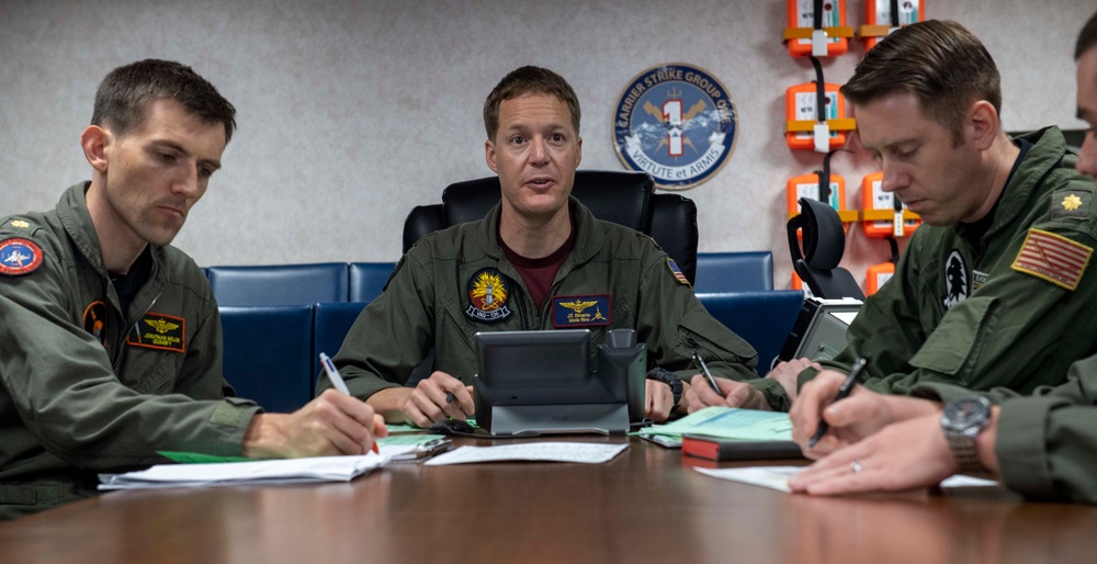 Carrier Air Wing 2 Aviators Conduct Brief During Large-Scale Joint Rehearsal