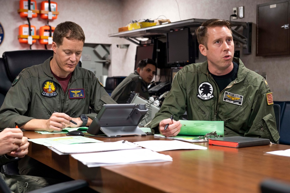 Carrier Air Wing 2 Aviators Conduct Brief During Large-Scale Joint Rehearsal