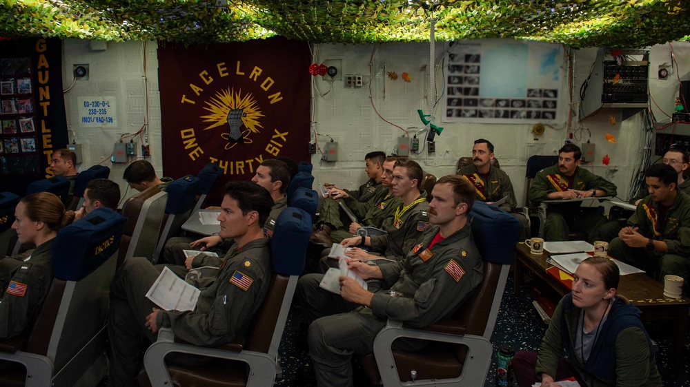 Carrier Air Wing 2 Aviators Conduct Brief During Large-Scale Joint Rehearsal