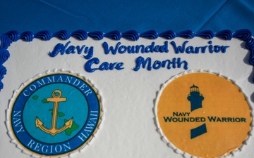 Navy Wounded Warriors Take Part in a Cake-Cutting Ceremony in Honor of Warrior Care Month