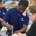 Navy Wounded Warriors Take Part in Wood Working Activities in Honor of Warrior Care Month