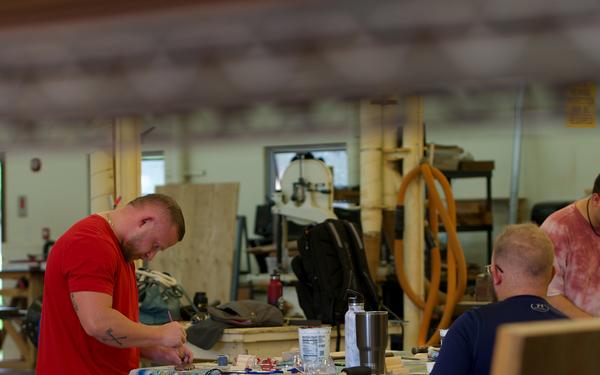 Navy Wounded Warriors Take Part in Wood Working Activities in Honor of Warrior Care Month