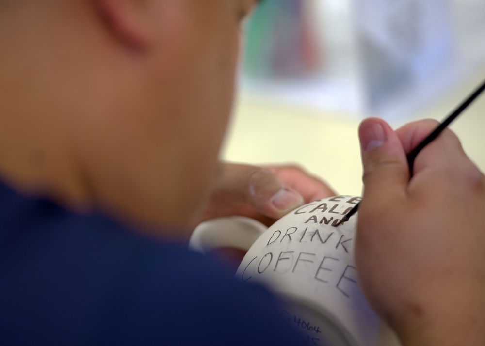 Navy Wounded Warriors Take Part in Ceramics in Honor of Warrior Care Month