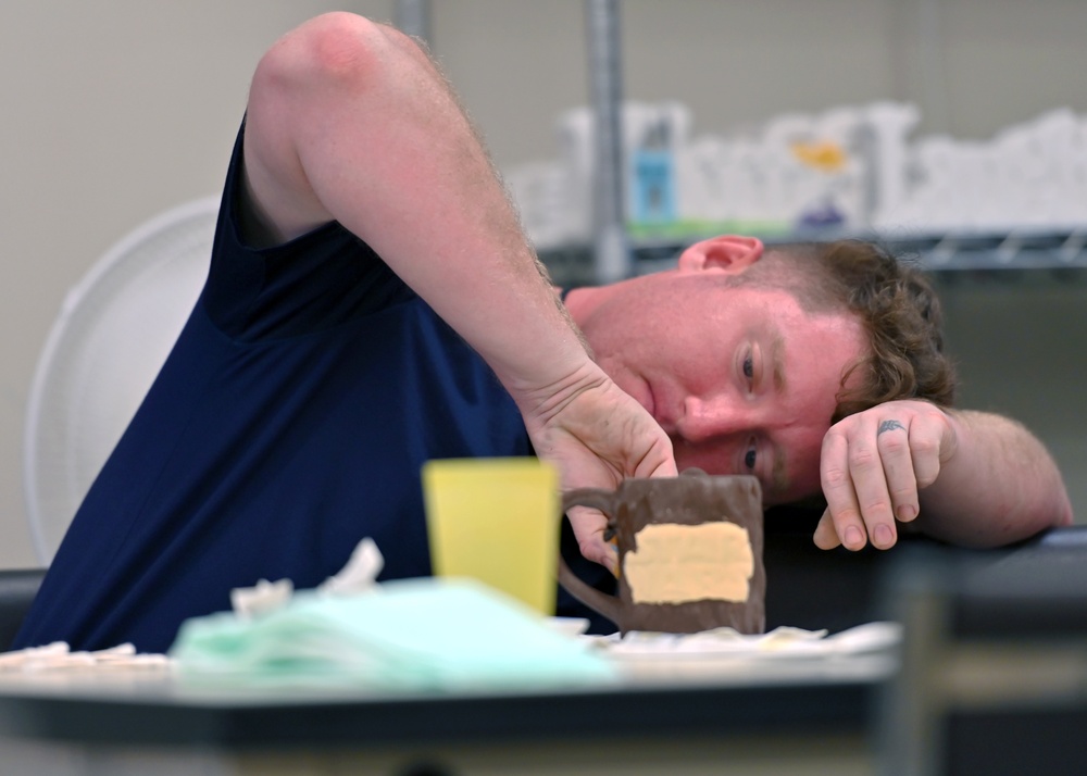 Navy Wounded Warriors Take Part in Ceramics in Honor of Warrior Care Month