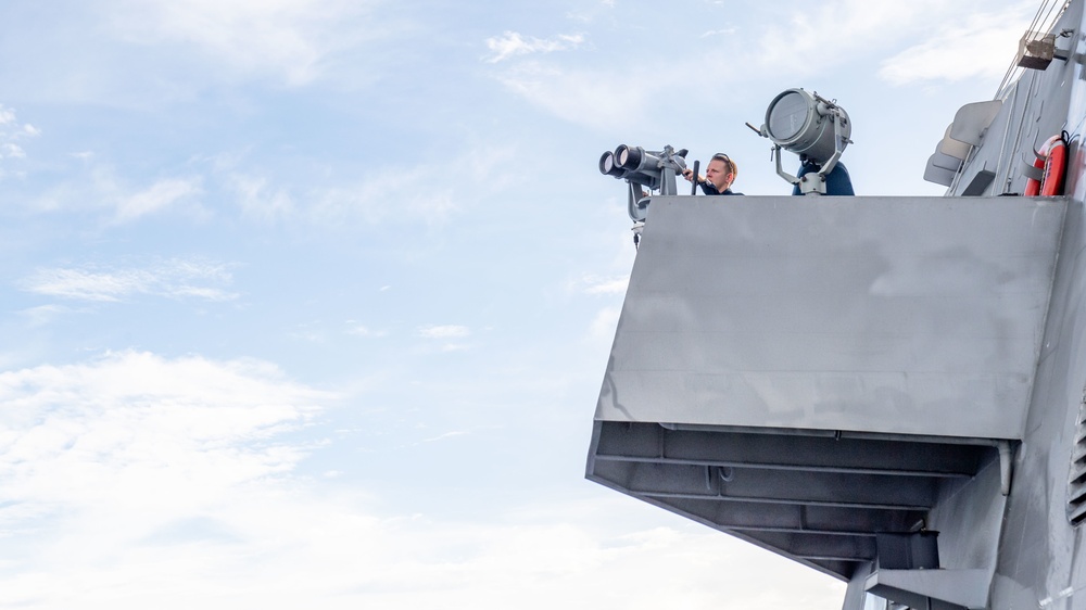 USS Charleston Sailor Stands Watch