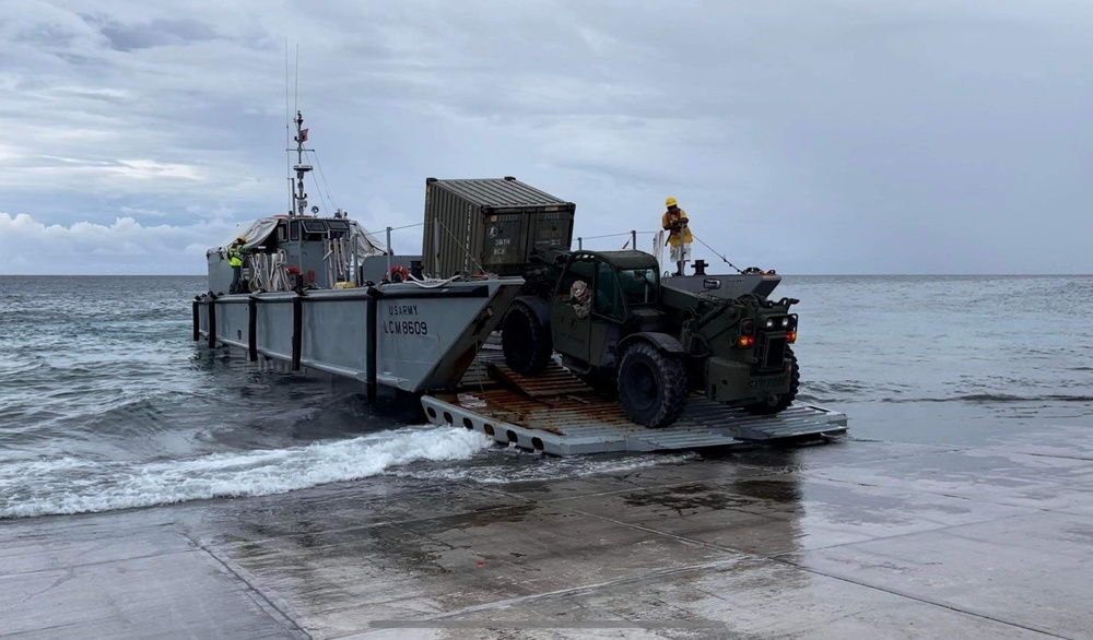 US Navy Seabees with NMCB-5 work with Marshallese Government