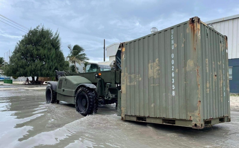 US Navy Seabees with NMCB-5 work with Marshallese Government