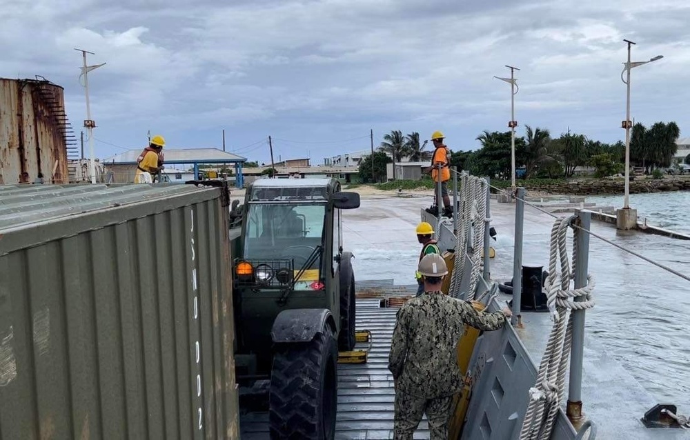 US Navy Seabees with NMCB-5 work with Marshallese Government