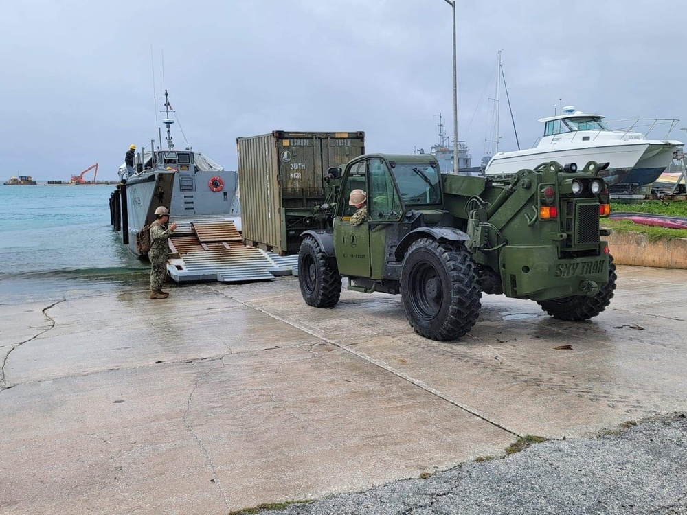 US Navy Seabees with NMCB-5 work with Marshallese Government