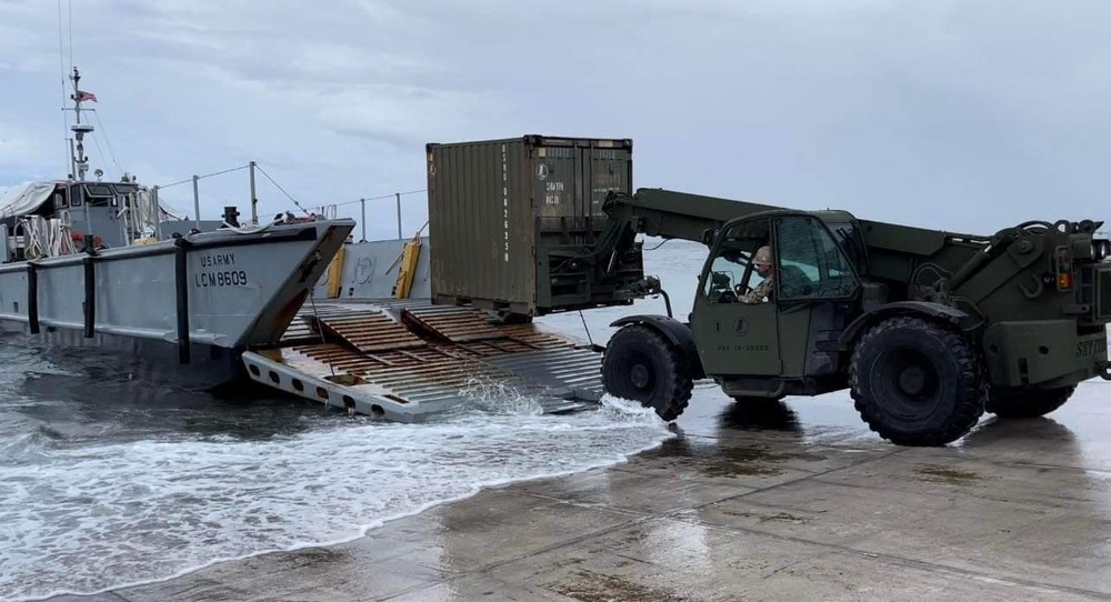 US Navy Seabees with NMCB-5 work with Marshallese Government