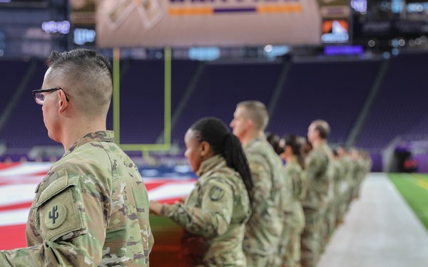 Military Members Participate in Salute to Service Football Game