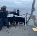 Sailors aboard USS Stockdale perform live fire exercise