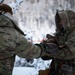 Arctic survival school students train with 210th RQS in recovery ops