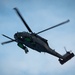 Arctic survival school students train with 210th RQS in recovery ops