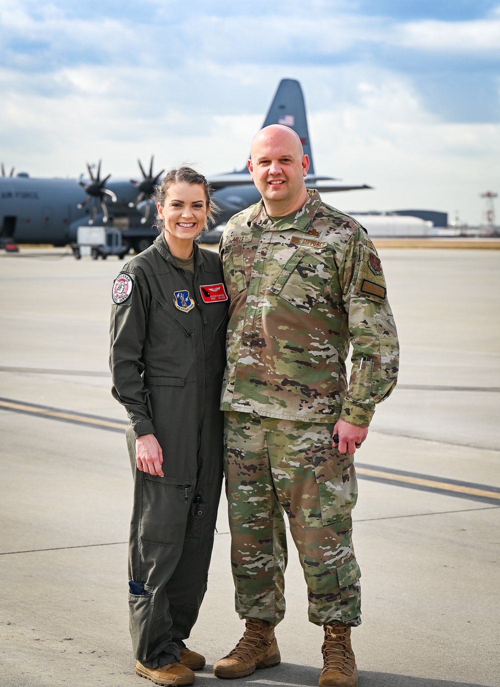 165th Airlift Wing loadmaster serves in the Georgia Air National Guard with her Father and Husband