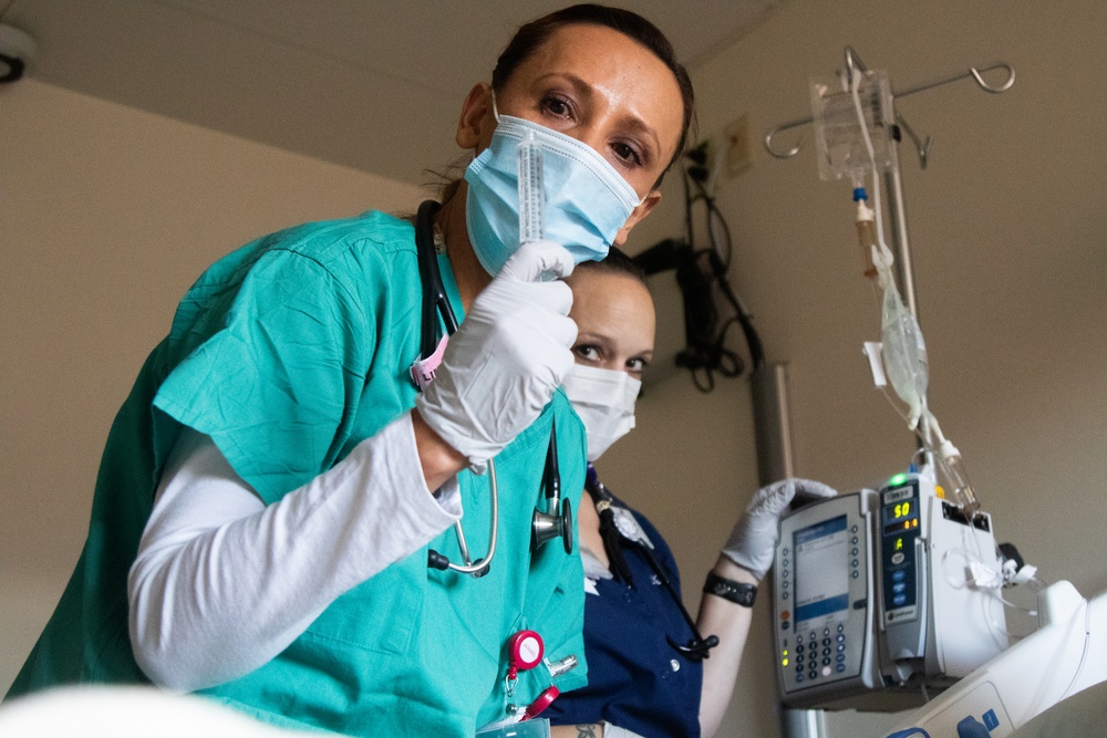 Department of Defense Airmen integrate into Colorado hospital's day-to-day operations