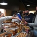 Students gobble up Thanksgiving meals at Crossroads