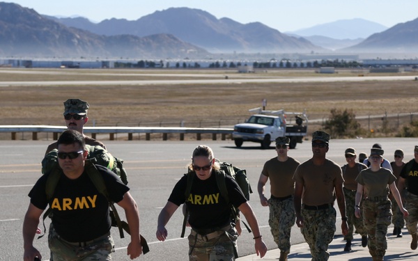 Service Members Participate in Veterans Day Ruck