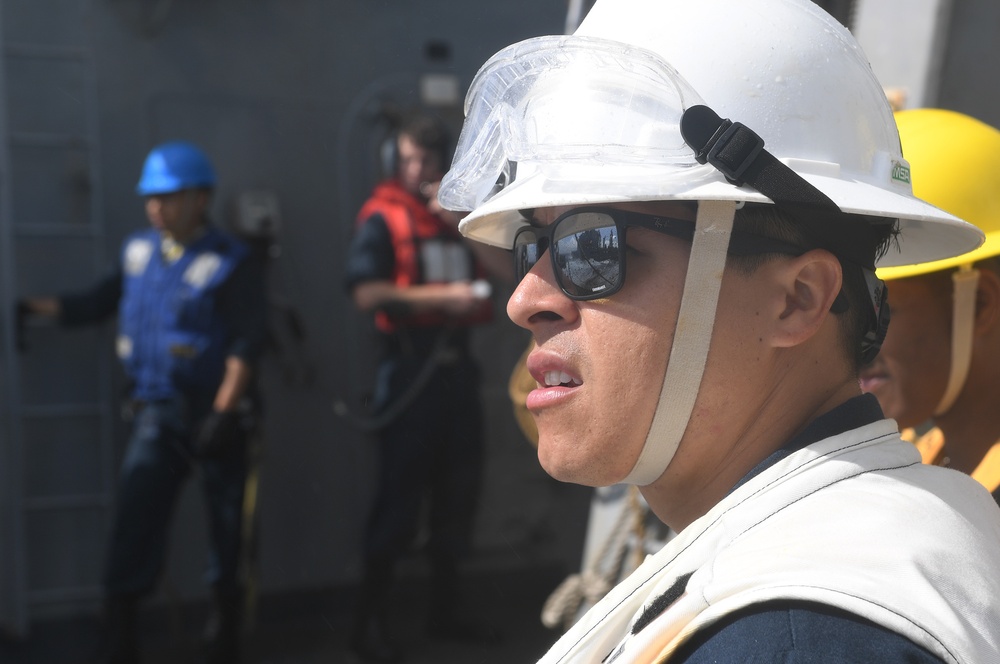 USS Chafee (DDG 90) Conducts Replenishment-At-Sea In South China