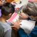 USCCB makes Thanksgiving Day turkey headbands for Afghan guests