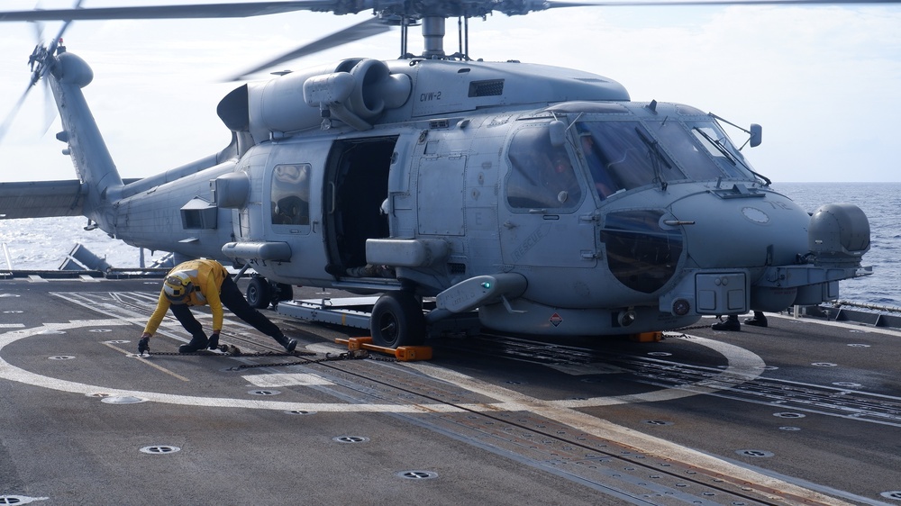 USS Lake Champlain conducts in-flight refueling drills in Philippine Sea