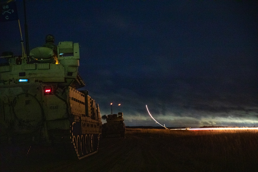 Soldiers with 3rd Battalion, 66th Armored Regiment, 1st Armored Brigade Combat Team, 1st Infantry Division conduct night live-fire