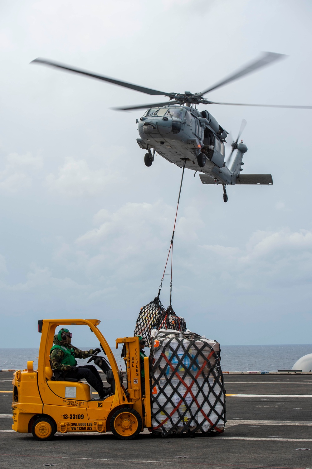 USS Carl Vinson (CVN 70) Conducts VERTREP with USNS Washington Chambers (T-AKE 11)