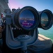 USS Sioux City Sailor Looks Through the Ship’s Binoculars