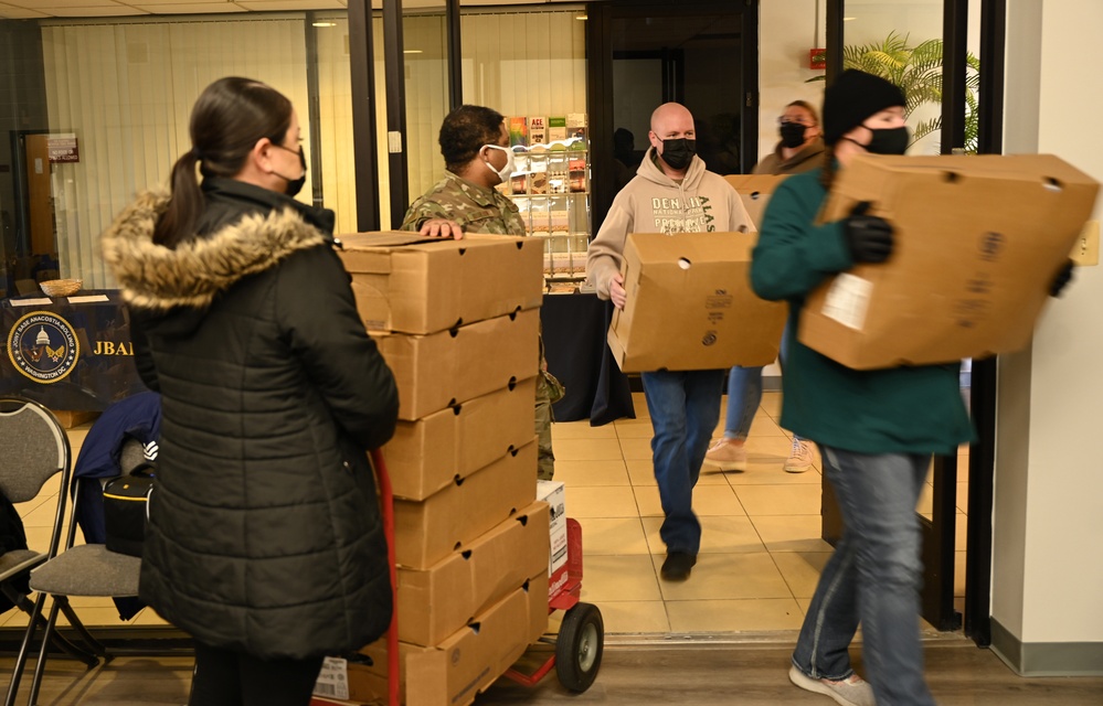 Joint Base Anacostia-Bolling and community volunteers help with holiday charitable food drive
