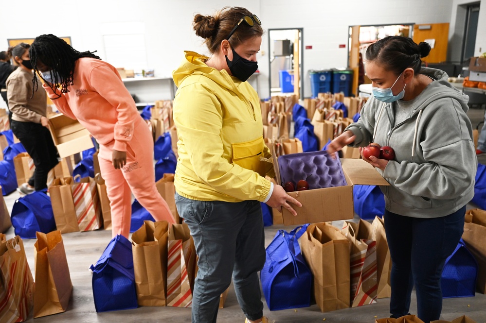Joint Base Anacostia-Bolling and community volunteers help with holiday charitable food drive