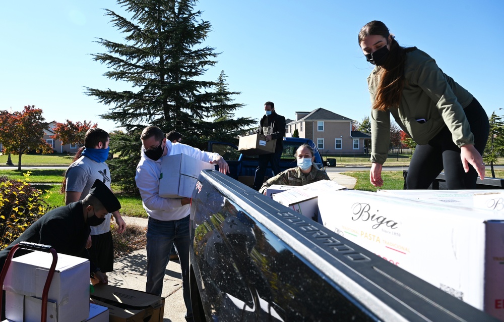 Joint Base Anacostia-Bolling and community volunteers help with holiday charitable food drive