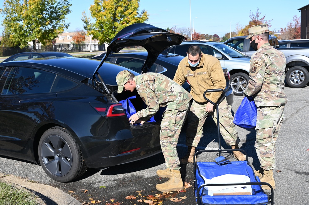 Joint Base Anacostia-Bolling and community volunteers help with holiday charitable food drive