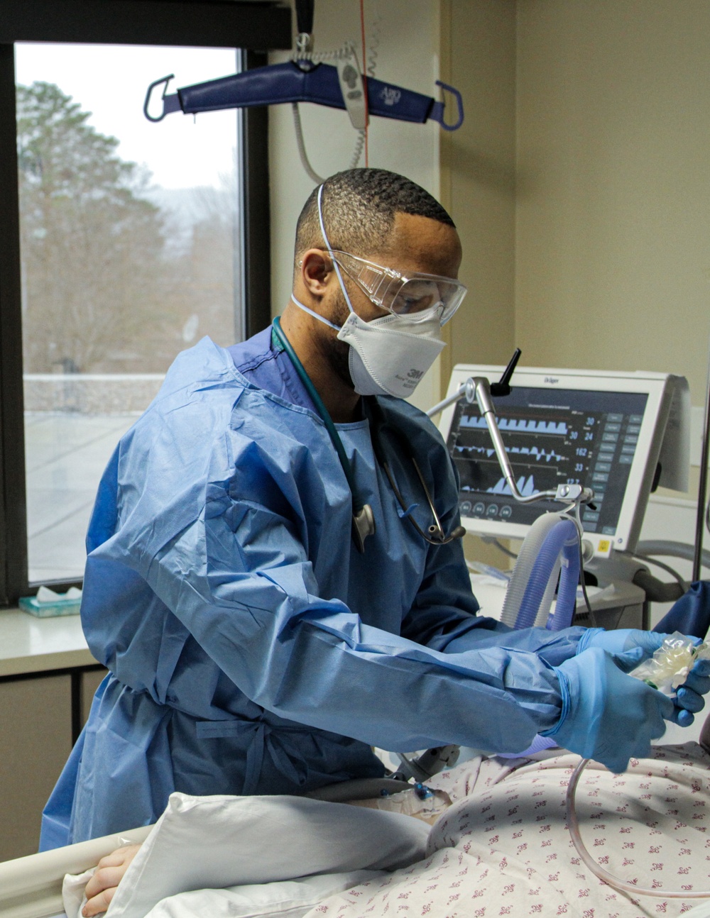 U.S. Navy Medical Readiness Team assist with operations at Providence St. Patrick Hospital